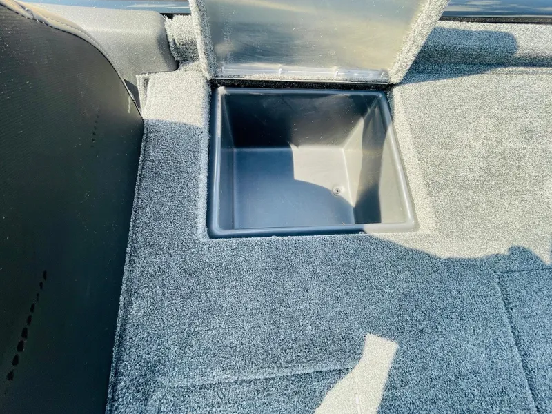 Slide: The Image of 2024 Tracker Pro Team 195 TXW Tournament Edition storage compartment. - 37