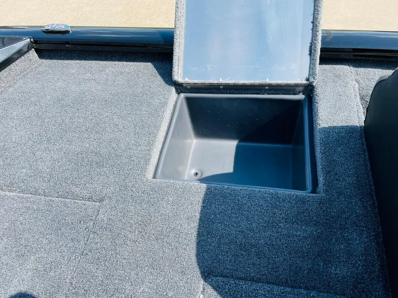 Slide: The Image of 2024 Tracker Pro Team 195 TXW Tournament Edition storage compartment. - 41