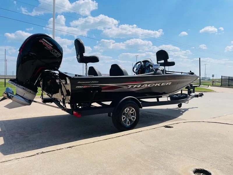 Slide: The Image of 2024 Tracker Pro Team 195 TXW Tournament Edition fishing boat on a trailer. - 5