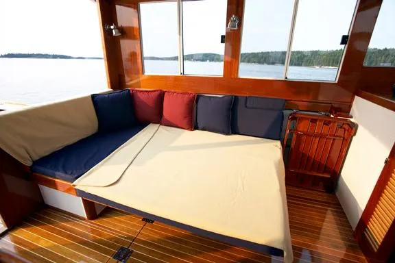 Slide: The Image of Luxurious interior of 2005 John Williams Custom 38 boat with comfortable seating and scenic view. - 8
