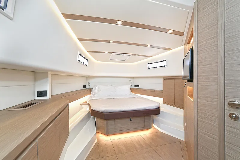 Slide: The Image of Luxurious interior cabin of 2023 Pardo Yachts 43, featuring modern design and cozy bed. - 19