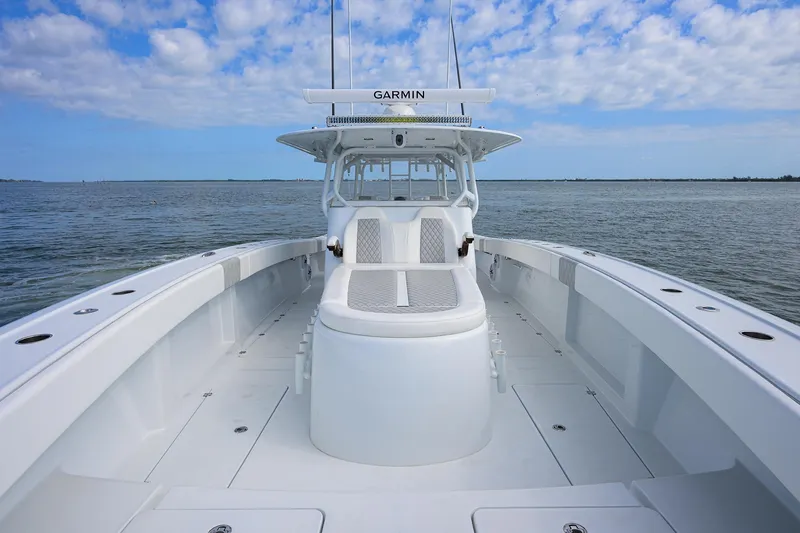 Slide: The Image of 2022 Freeman Center Console boat on open water under blue sky. - 10