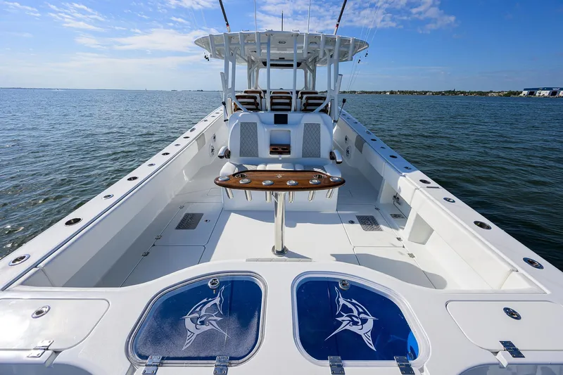 Slide: The Image of 2022 Freeman Center Console boat on open water. - 15