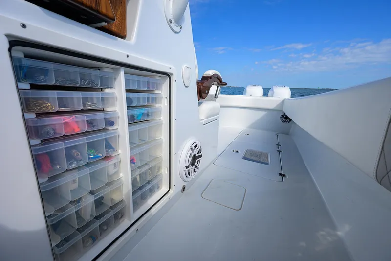 Slide: The Image of 2022 Freeman Center Console boat with organized tackle storage on deck. - 22