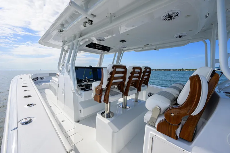 Slide: The Image of 2022 Freeman Center Console boat interior with luxurious seating and ocean view. - 29