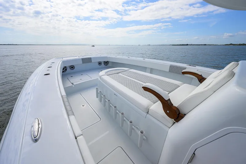 Slide: The Image of 2022 Freeman Center Console boat with spacious seating and ocean view. - 3