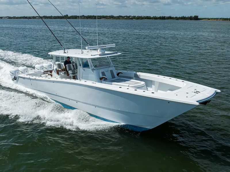 Slide: The Image of 2022 Freeman Center Console boat cruising on open water. - 37