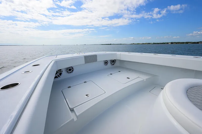 Slide: The Image of 2022 Freeman Center Console boat with spacious deck and ocean view. - 5