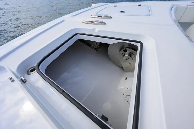 Slide: The Image of 2022 Freeman Center Console boat storage compartment. - 8