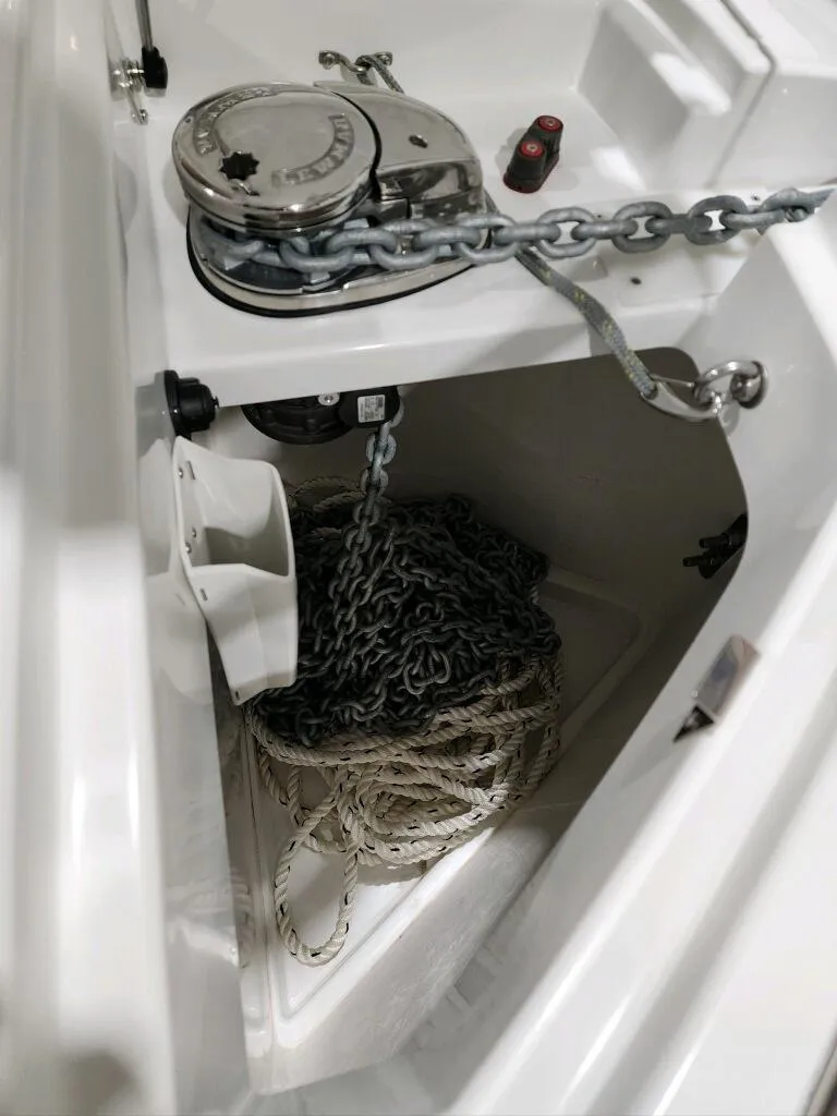Slide: The Image of 2024 Wellcraft 355 Commuter anchor chain and rope storage compartment. - 21