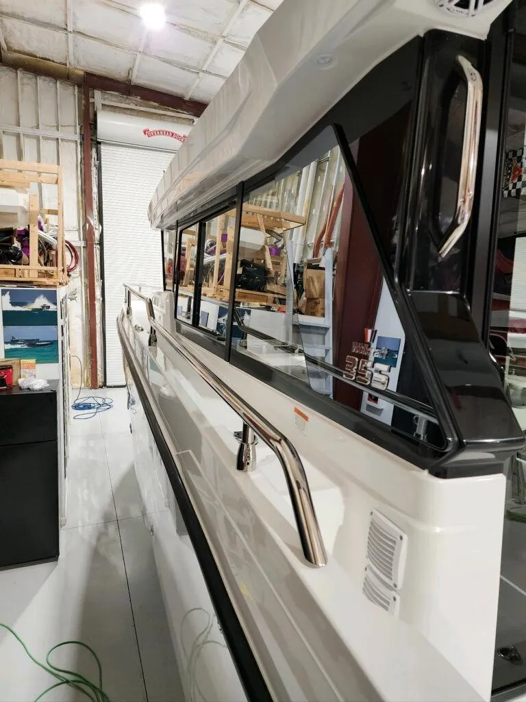 Slide: The Image of 2024 Wellcraft 355 Commuter boat in a storage facility. - 26