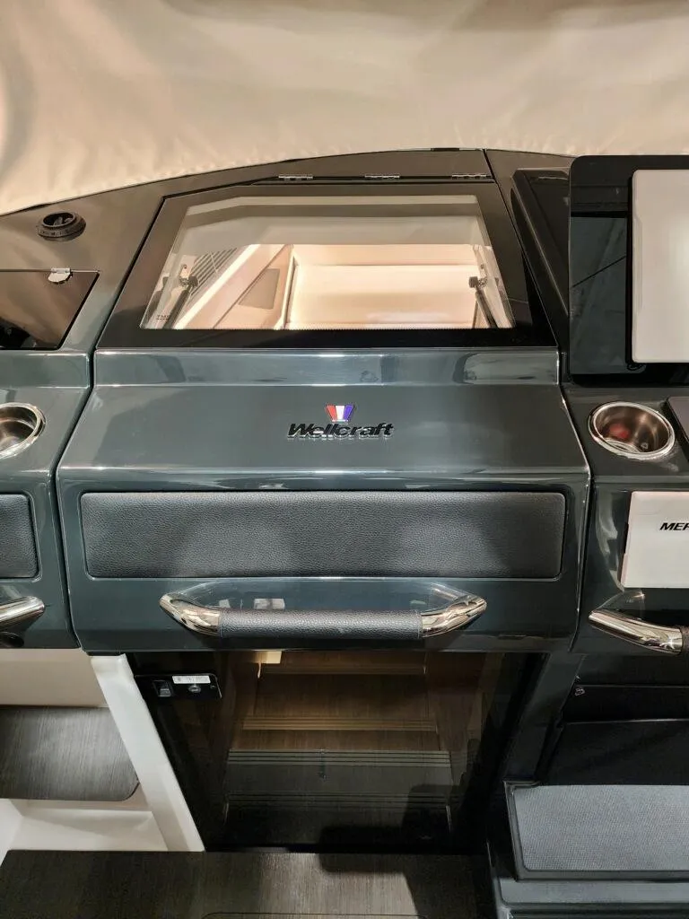 Slide: The Image of 2024 Wellcraft 355 Commuter boat interior dashboard and control panel. - 37