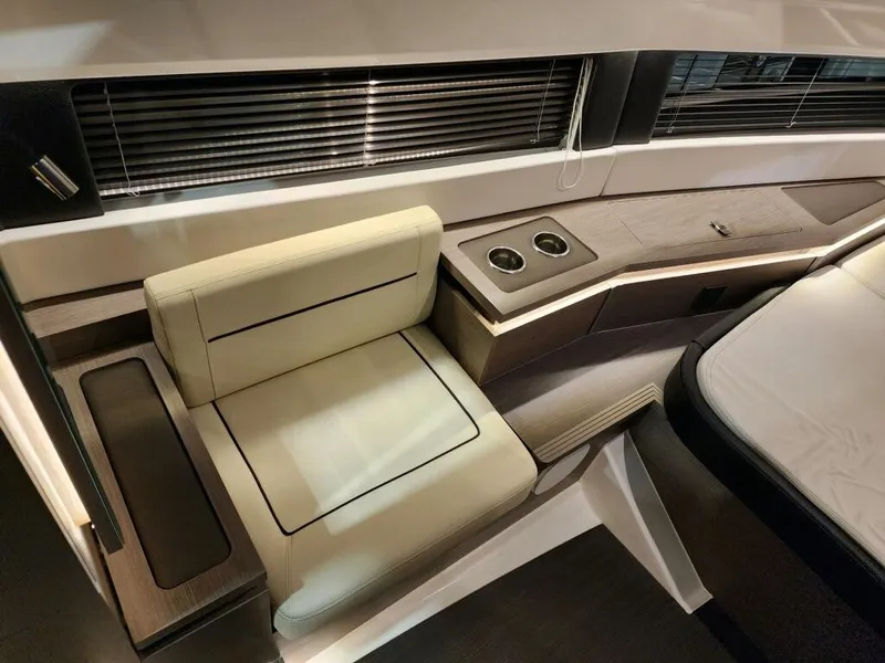 Slide: The Image of Interior seating and table area of 2024 Wellcraft 355 Commuter boat. - 39