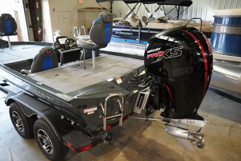 Slide: The Image of 2024 Ranger RT198P fishing boat with Mercury Pro XS engine in showroom. - 3