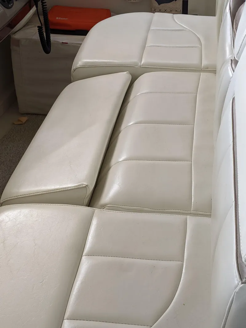 Slide: The Image of White leather seating on a 2000 Carver 506 Motor Yacht. - 10