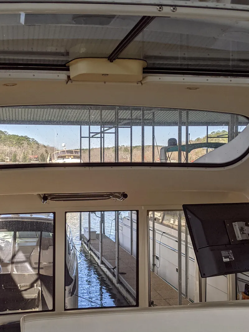 Slide: The Image of Interior view of 2000 Carver 506 Motor Yacht docked at marina. - 18