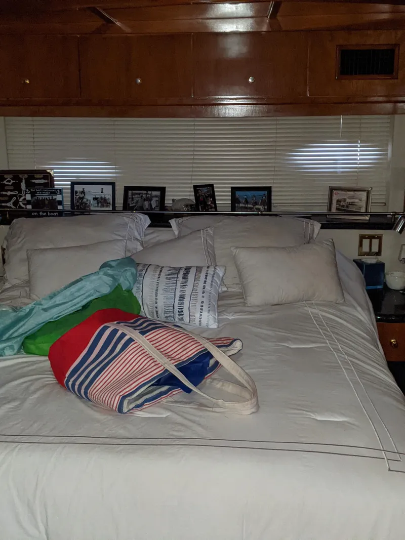 Slide: The Image of Interior bedroom of 2000 Carver 506 Motor Yacht with bed and decor. - 29