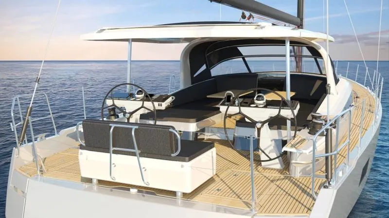 Slide: The Image of 2024 Jeanneau 65 yacht with dual helm, spacious deck, and sleek design on open water. - 16