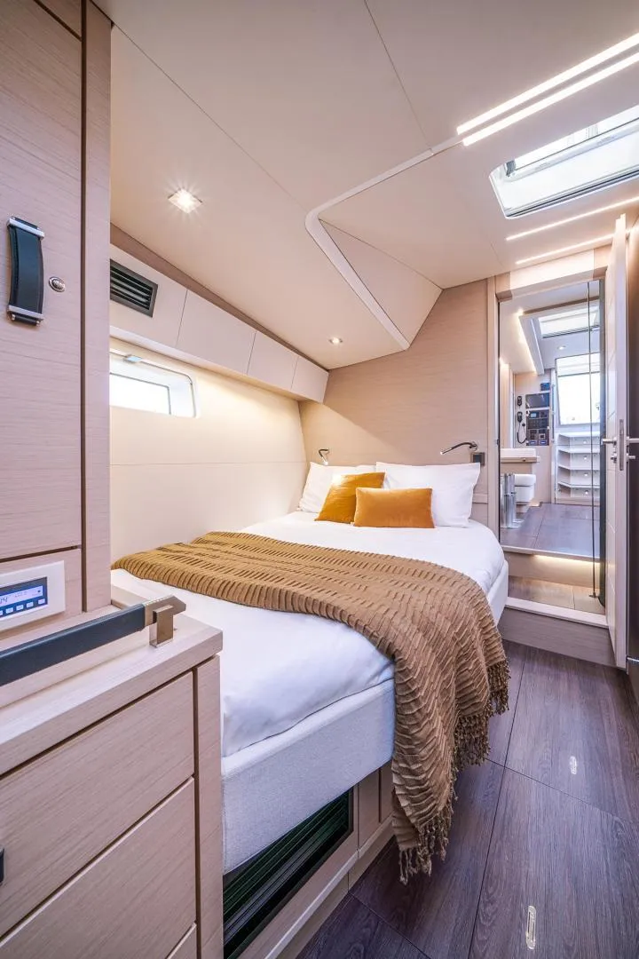 Slide: The Image of Luxurious interior of 2024 Jeanneau 65 yacht with cozy bedroom and modern design. - 20