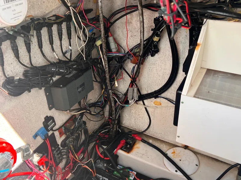 Slide: The Image of 2015 Triton 240 LTS boat wiring and electrical components. - 19