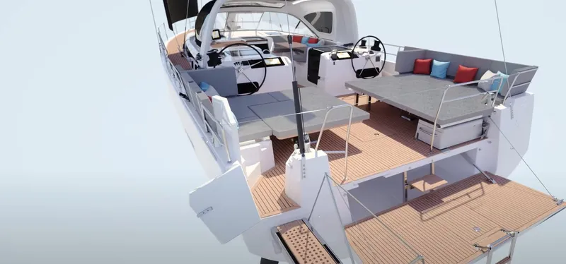 Slide: The Image of 2024 Jeanneau Yacht 55, spacious deck with dual steering wheels and seating area. - 14