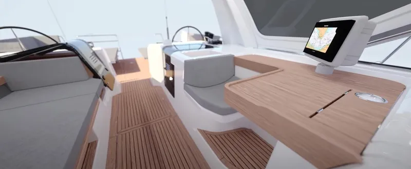 Slide: The Image of 2024 Jeanneau Yacht 55 interior with modern navigation system and sleek wooden finishes. - 17