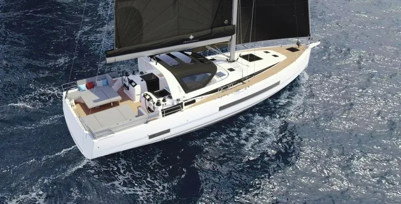 Slide: The Image of 2024 Jeanneau Yacht 55 sailing on open water, showcasing sleek design and modern features. - 9