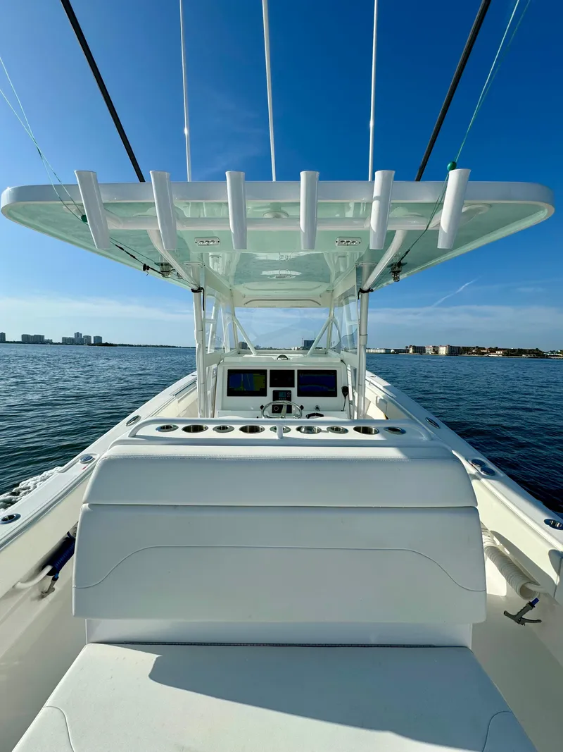 Slide: The Image of 2022 Invincible 39' Open Fisherman boat on calm water. - 16