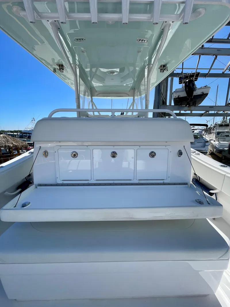 Slide: The Image of 2022 Invincible 39' Open Fisherman boat interior with storage compartments. - 18
