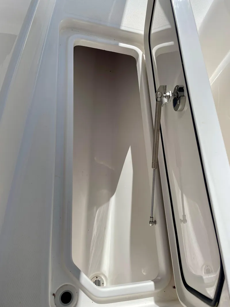Slide: The Image of Open storage compartment on 2022 Invincible 39' Open Fisherman boat. - 24
