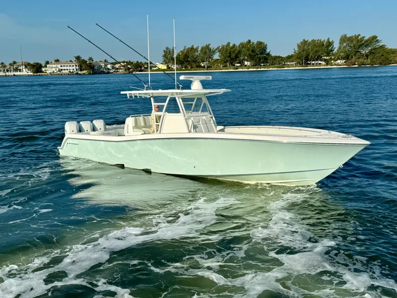 Slide: The Image of 2022 Invincible 39' Open Fisherman boat cruising on the water. - 27