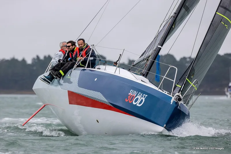 Slide: The Image of 2024 Jeanneau SUNFAST 30 ONE DESIGN sailing with crew on a windy day. - 8