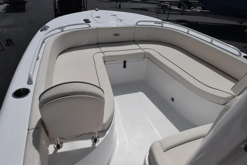 Slide: The Image of 2024 Sea Hunt Escape 25 boat with spacious seating and sleek design. - 15