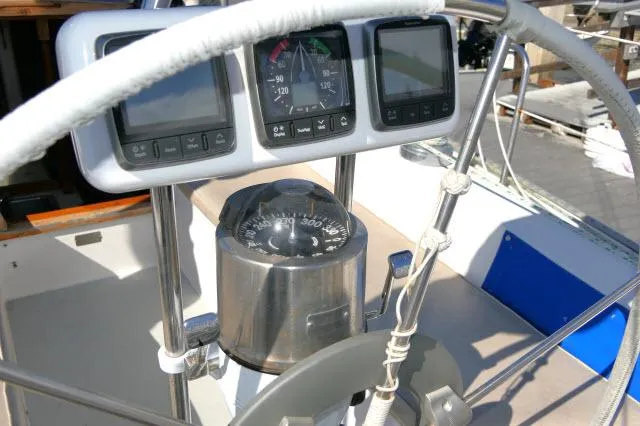 Slide: The Image of Cockpit of 1991 Catalina 36 sailboat with navigation instruments and compass. - 40