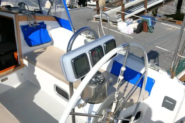 Slide: The Image of Cockpit of a 1991 Catalina 36 sailboat with navigation instruments. - 41