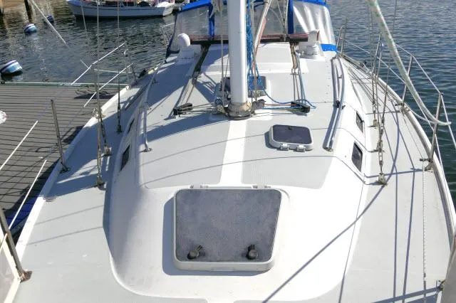 Slide: The Image of 1991 Catalina 36 sailboat docked at marina. - 47