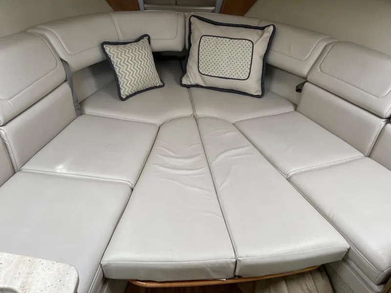 Slide: The Image of 2017 Formula 350 Sun Sport cabin with white leather seating and decorative pillows. - 26