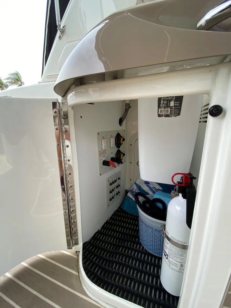 Slide: The Image of 2017 Formula 350 Sun Sport storage compartment with safety equipment. - 24