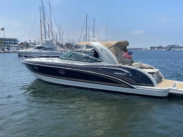 Slide: The Image of 2017 Formula 350 Sun Sport boat docked in a marina. - 5