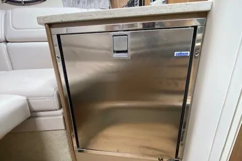 Slide: The Image of Stainless steel refrigerator in 2017 Formula 350 Sun Sport boat interior. - 21