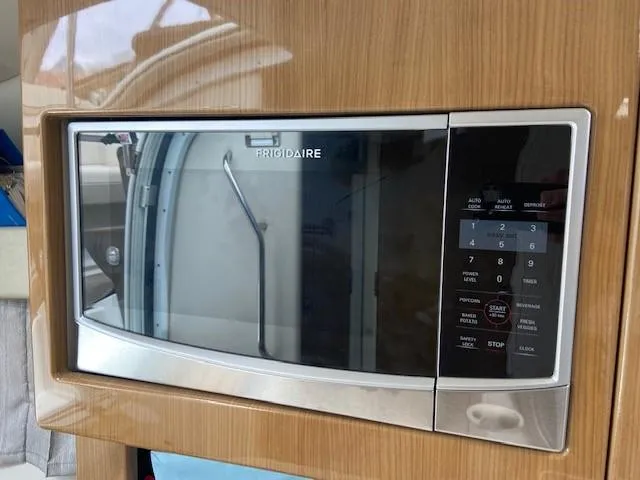 Slide: The Image of Frigidaire microwave in 2017 Formula 350 Sun Sport boat kitchen. - 33