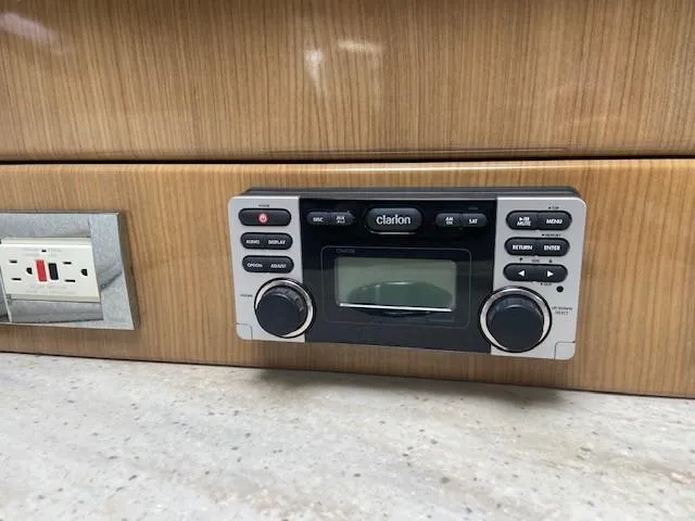 Slide: The Image of Clarion stereo system in 2017 Formula 350 Sun Sport boat interior. - 29