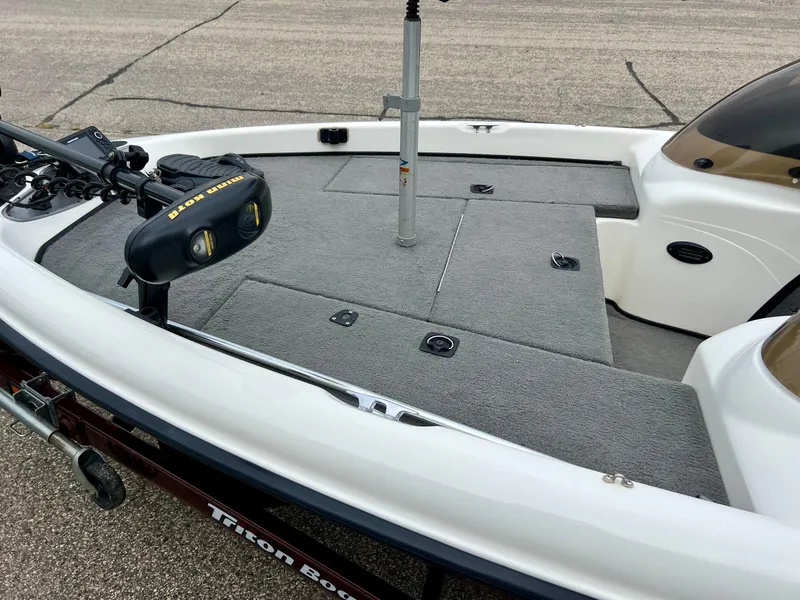 Slide: The Image of 2000 Triton TR170C fishing boat deck with trolling motor. - 5