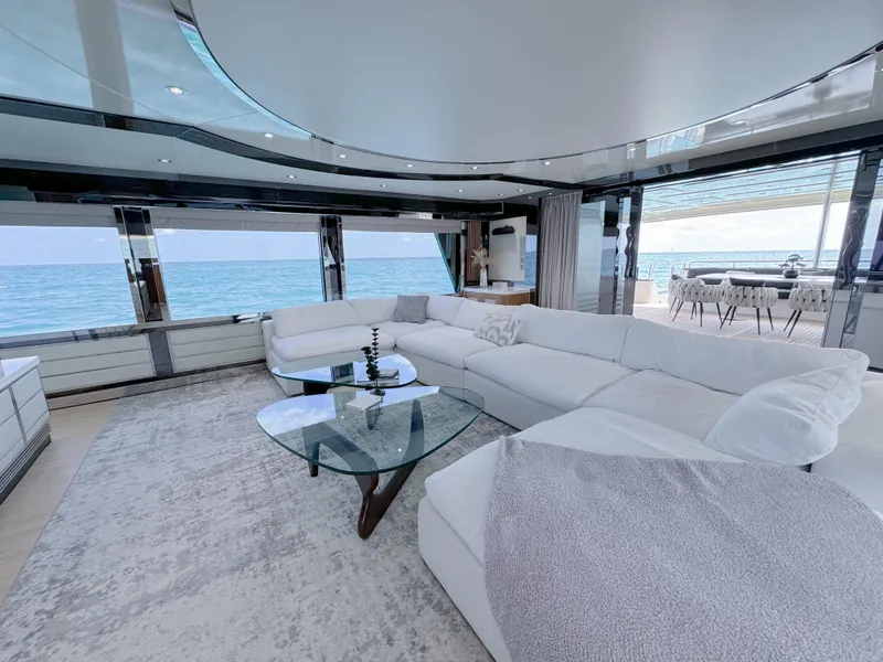 Slide: The Image of Luxurious 2010 WHS Marine yacht interior with white sectional sofa and ocean view. - 11