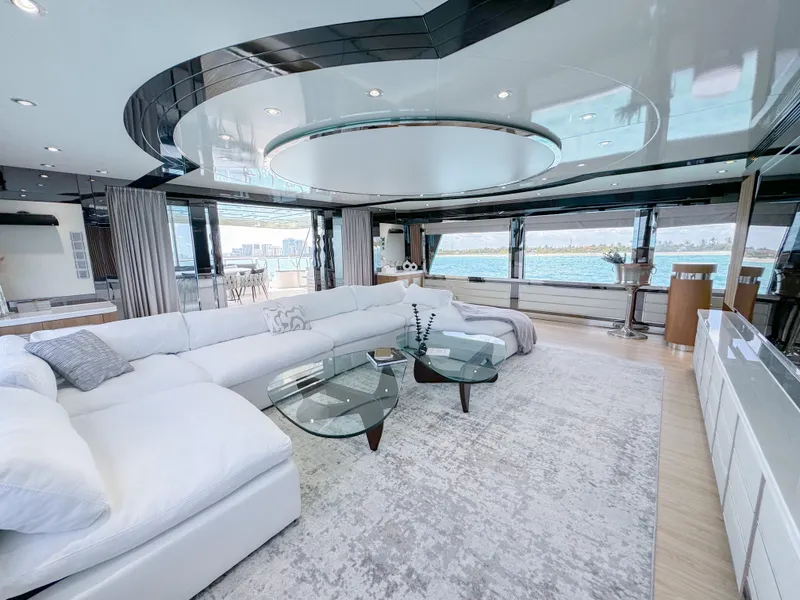 Slide: The Image of Luxurious 2010 Custom WHS Marine yacht interior with modern white sectional sofa and glass tables. - 12