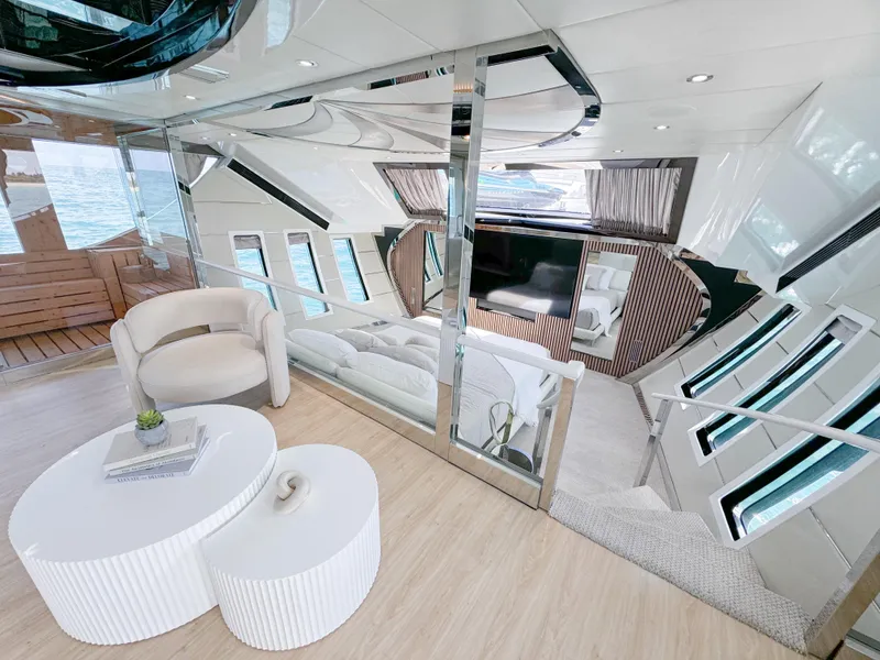 Slide: The Image of Luxurious interior of 2010 Custom WHS Marine yacht with modern furnishings and panoramic windows. - 14