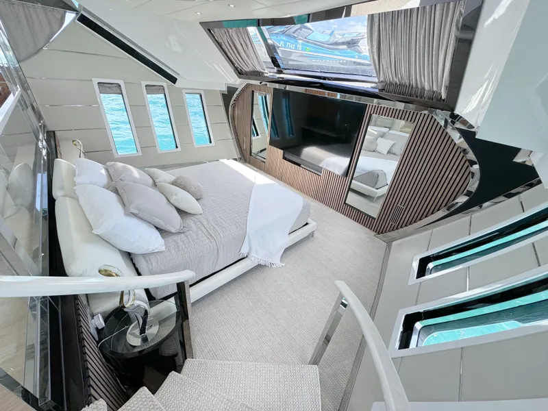 Slide: The Image of Luxurious bedroom interior of 2010 Custom WHS Marine yacht with panoramic windows and modern decor. - 15
