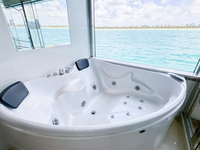 Slide: The Image of Luxurious hot tub on a 2010 Custom WHS Marine yacht with ocean view. - 20