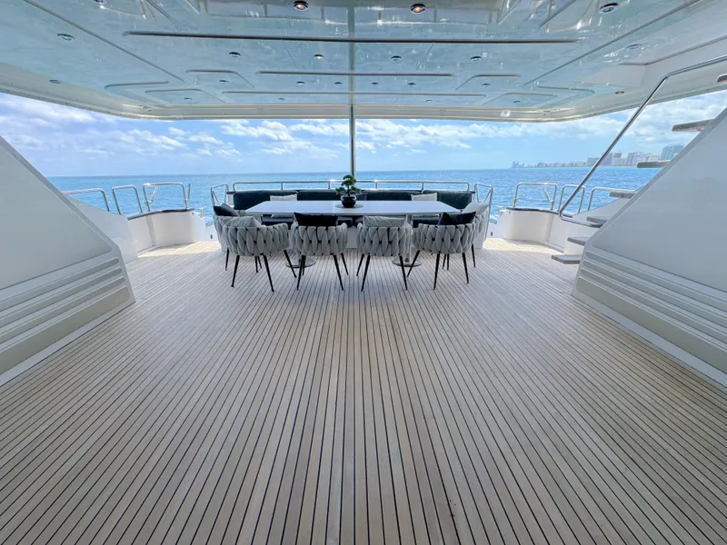 Slide: The Image of Luxurious 2010 Custom WHS Marine yacht deck with ocean view and elegant dining area. - 26