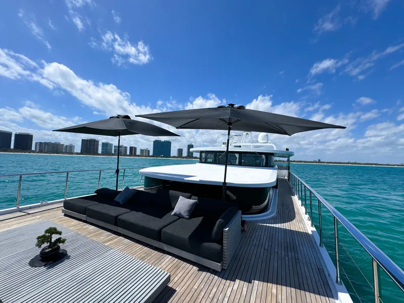 Slide: The Image of Luxury Custom WHS Marine 2010 yacht with sun deck, umbrellas, and ocean view. - 29